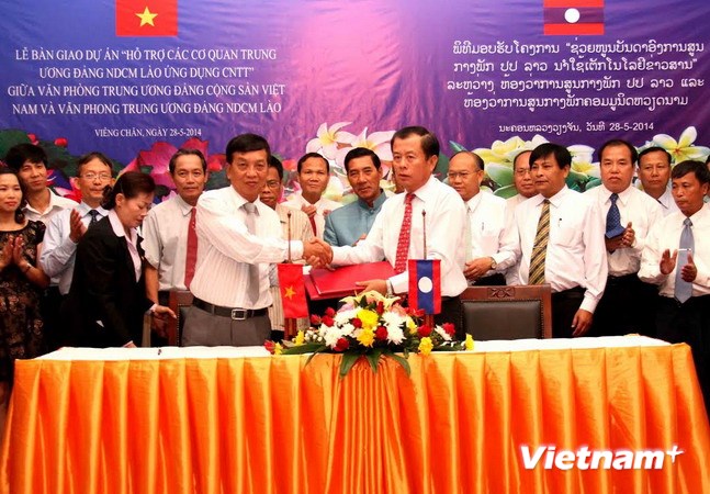 ມອບຮັບໂຄງການໜູນຊ່ວຍການນຳໃຊ້ເຕັກໂນໂລຊີຂໍ້ມູນໃຫ້ລາວ